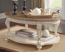 Load image into Gallery viewer, Realyn Oval Cocktail Table
