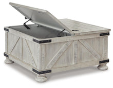 Load image into Gallery viewer, Carynhurst Cocktail Table with Storage
