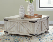 Load image into Gallery viewer, Carynhurst Cocktail Table with Storage
